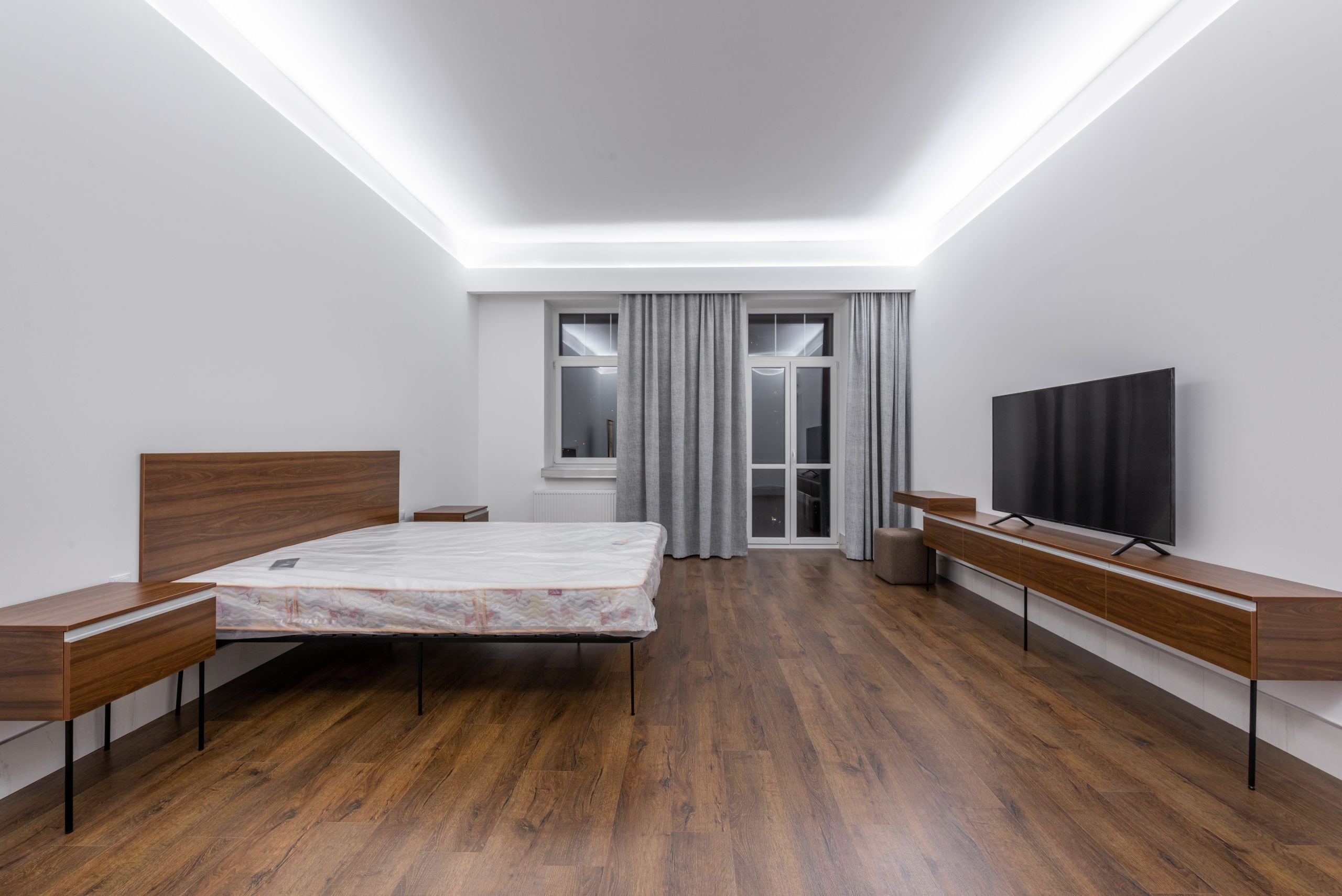Wood-look luxury vinyl plank flooring in a Utah bedroom